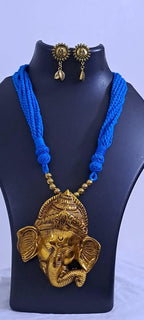 Blue thread necklace with golden oxidised ganesha pendant