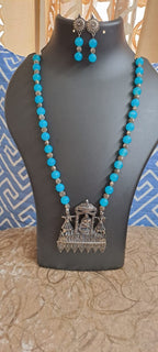 Glass beads necklace with oxidised silver pendant