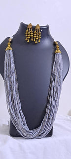 Exclusive multi layered  grey glass beads necklace set with golden oxidised matching earrings