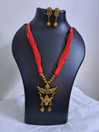 Red thread necklace with golden oxidised Durga pendant n matching earrings