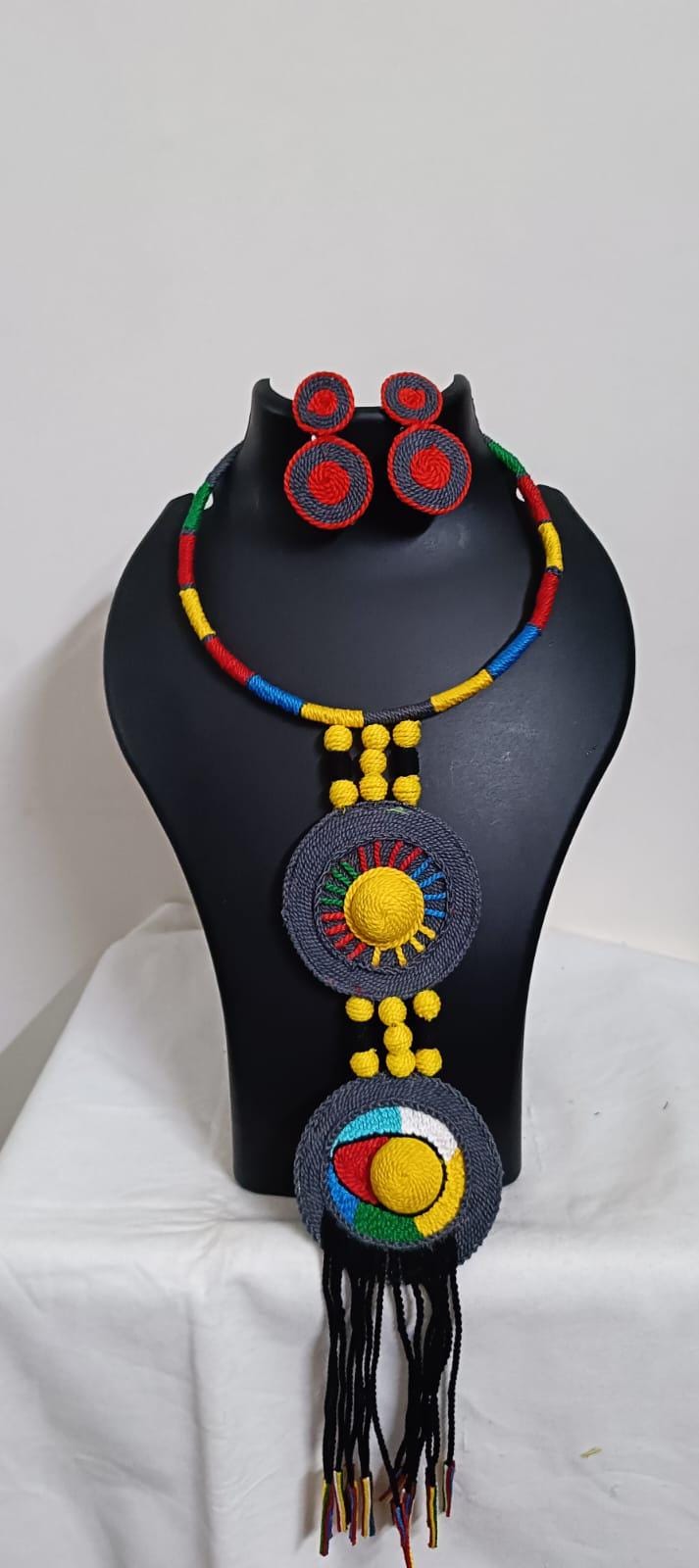 Exclusive multicoloured hasuli thread necklace set with round thread pendant n matching earrings
