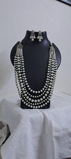 Multi layered glass pearl necklace set with matching earrings