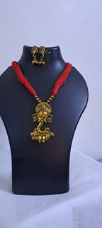 Red thread necklace with Golden oxidised traditional pendant