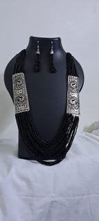 Exclusive silver oxidised set with layers of black seed beads n matching earrings