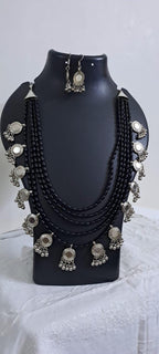 Exclusive multi layered  black glass beads necklace set with silver oxidised charms n matching earrings