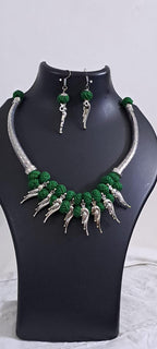 Green thread necklace with kolhapuri silver oxidised traditional beads and matching earrings