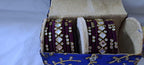 Purple colour traditional thread kundan bangles with zari bangle box