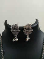 Oxidised silver chain with traditional pendant and matching earrings.