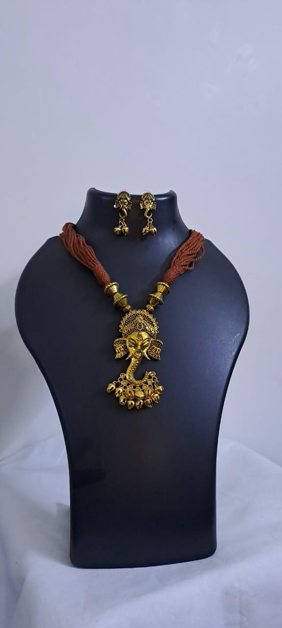 Brown thread necklace with Golden oxidised traditional pendant