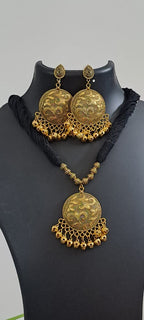 Black thread necklace with Golden oxidised traditional pendant