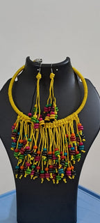 Exclusive yellow thread neckband with fringes and matching earrings.
