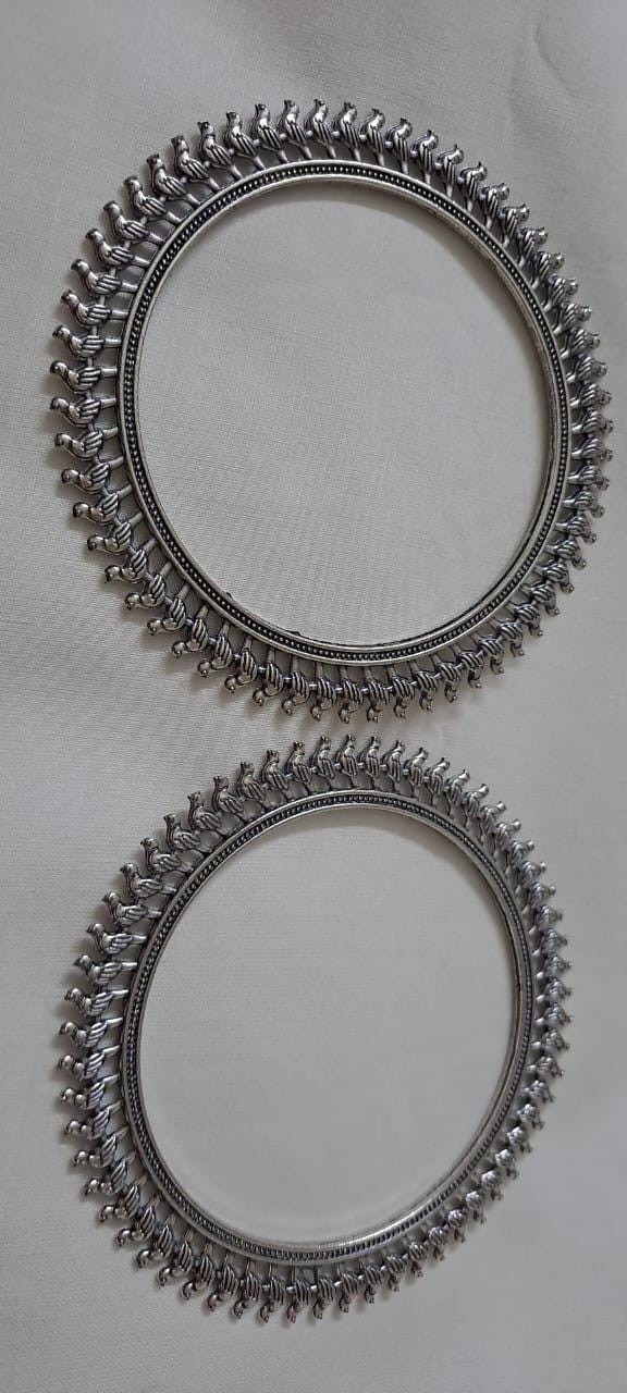 Traditional silver oxidised bangles with birds border.