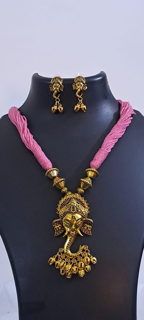 Pink thread necklace with Golden oxidised traditional pendant