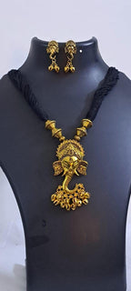 Black thread necklace with Golden oxidised traditional pendant