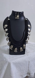 Exclusive multi layered  black glass beads necklace set with silver oxidised charms n matching earrings