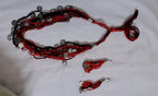 Exclusive multi-coloured and multi-layered thread necklace with silver oxidised charms