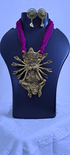 Pink thread necklace with oxidised golden durga pendant