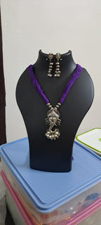 Purple thread necklace with oxidised silver ganesha pendant