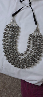 Multi-layered silver oxidised beads necklace .