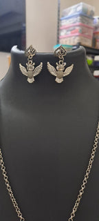 Oxidised silver chain with owl pendant and matching earrings.