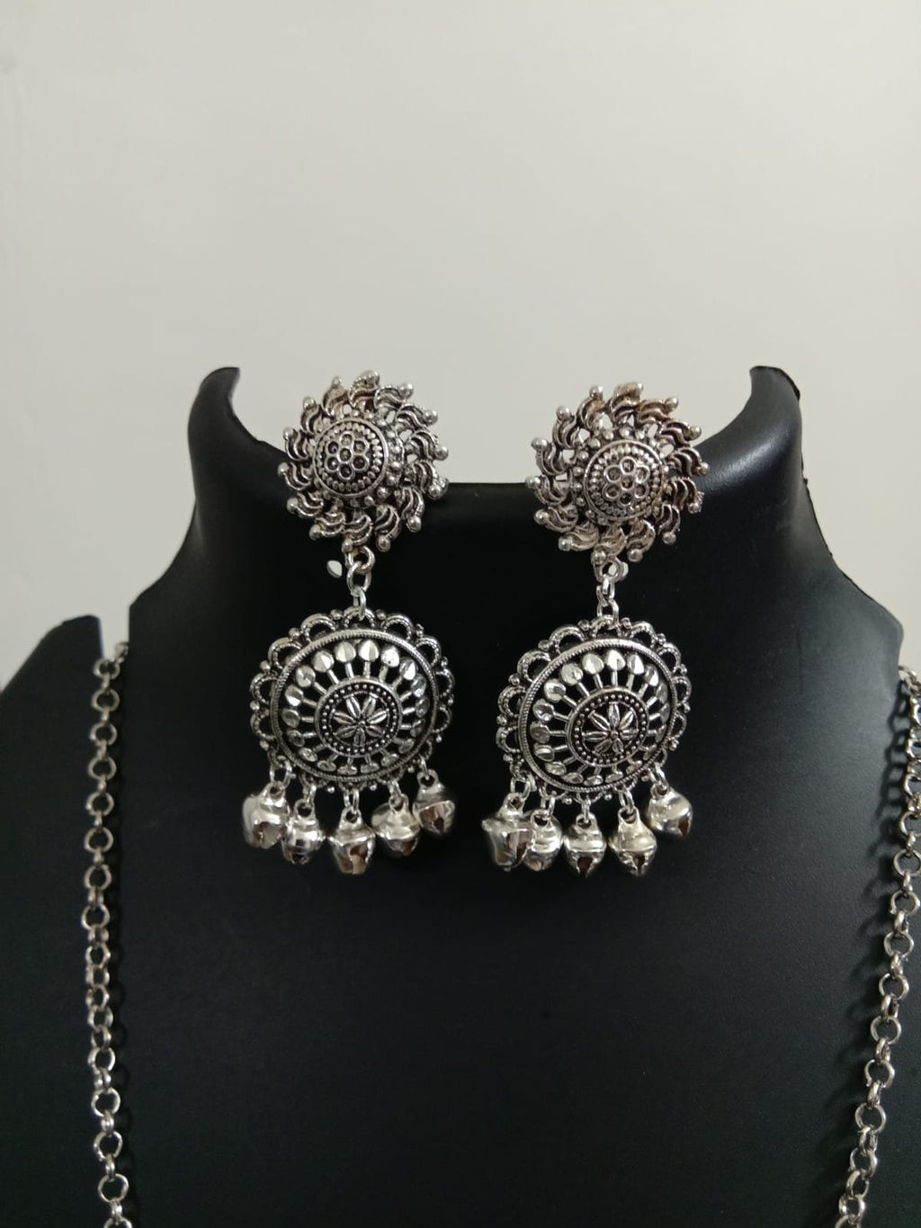 Oxidised silver chain with traditional pendant and matching earrings.