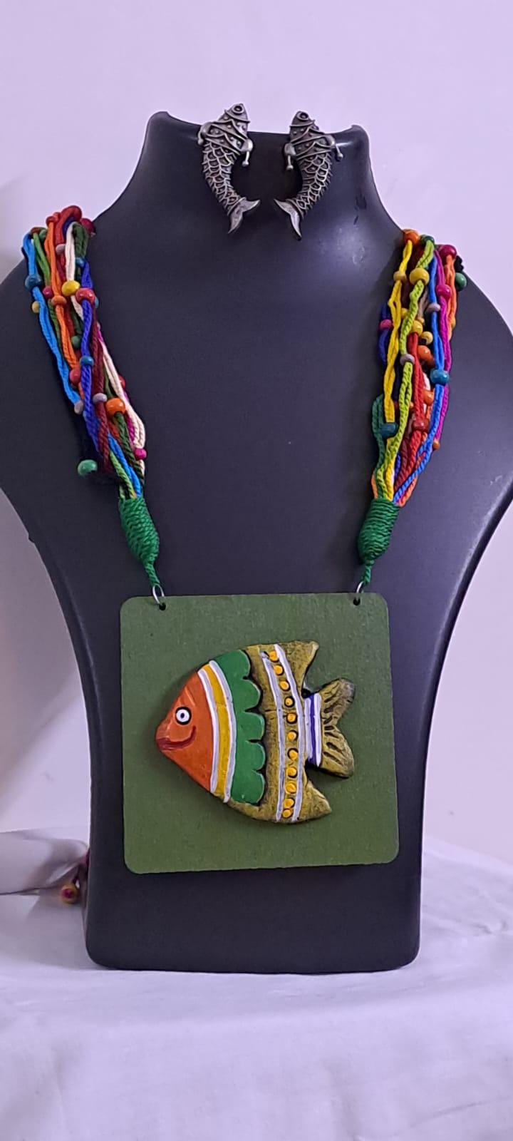 Terracotta fish pendant and thread necklace