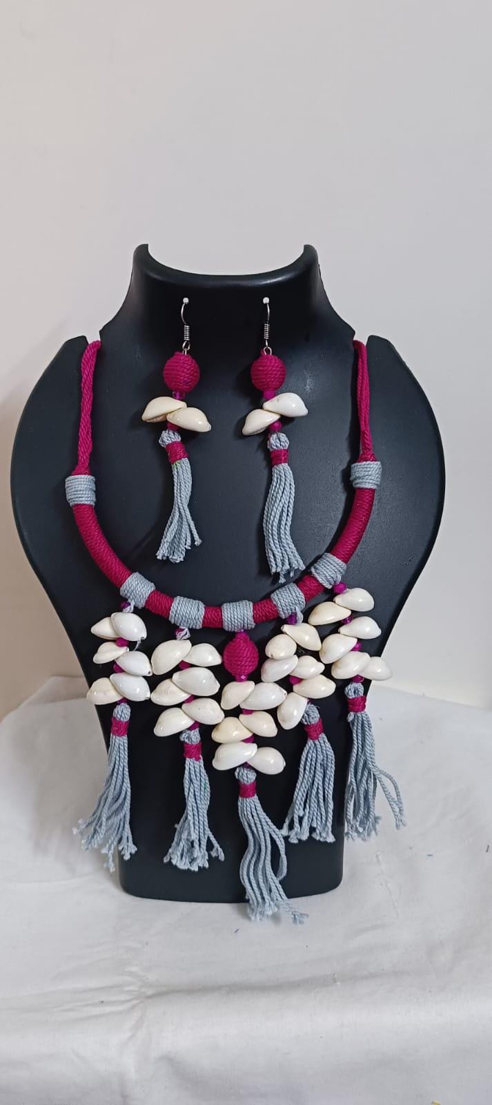 Exclusive pink n grey hasuli thread necklace set with shell fringes n matching earrings