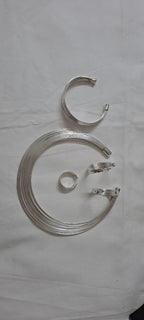 Exclusive multi layered  wired silver oxidised neckband with matching earrings, bracelet n ring