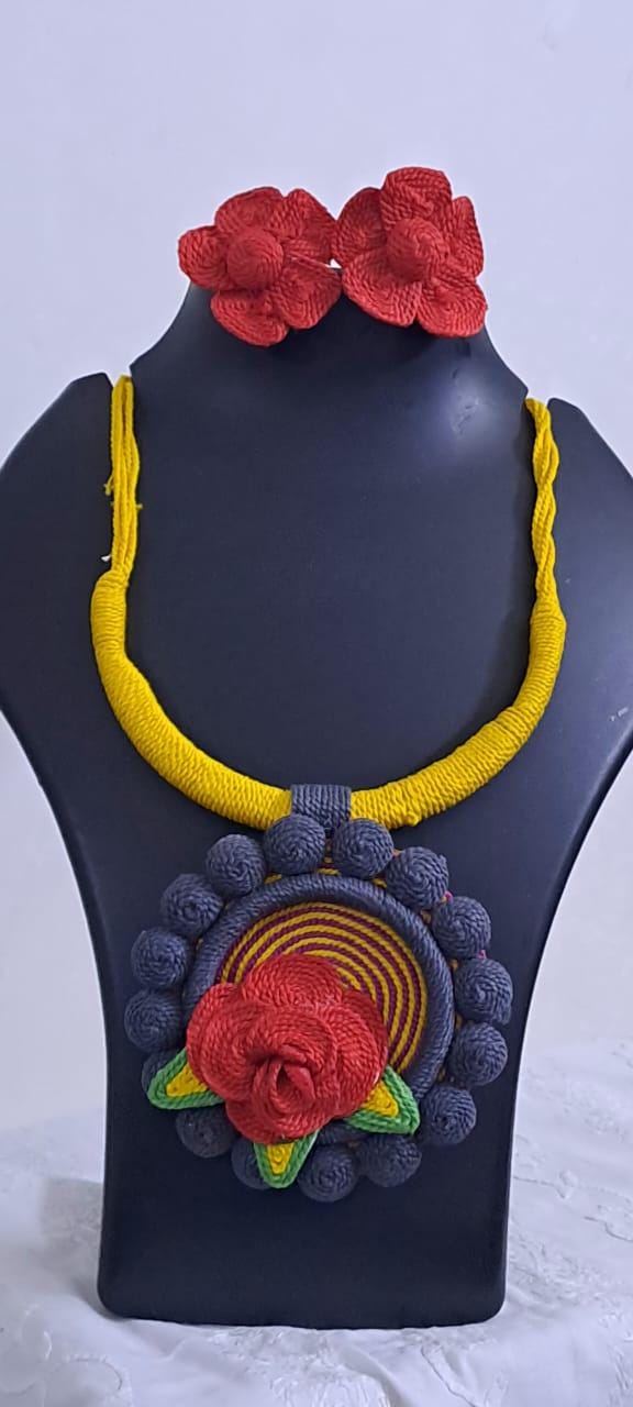 Exclusive multicoloured thread necklace set with round thread pendant n matching flower earrings