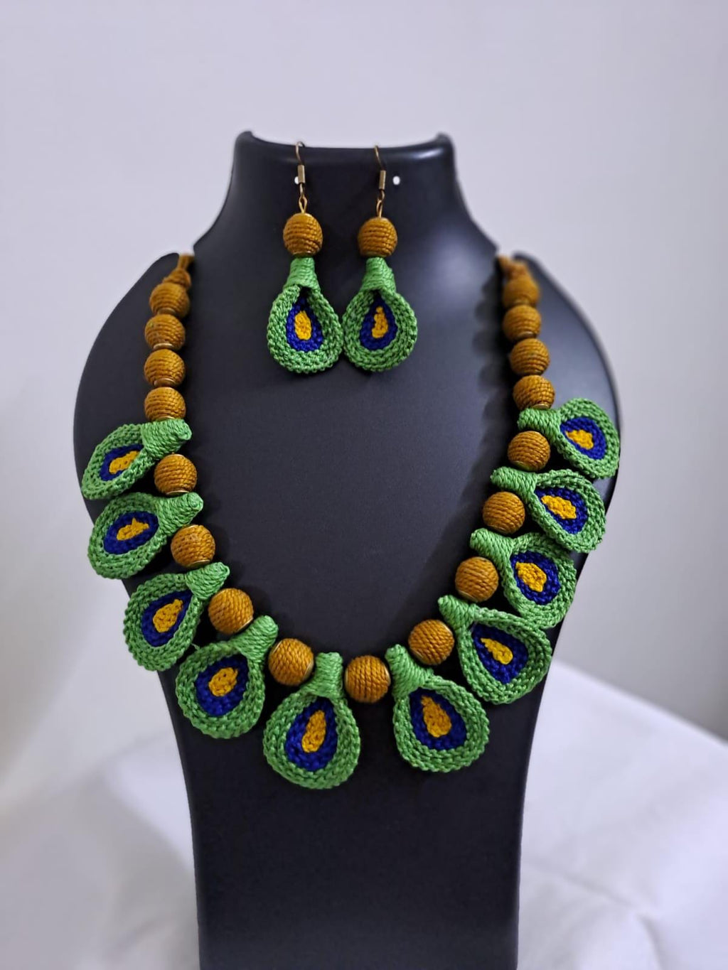 Green n yellow thread necklace with matching thread earrings.