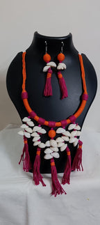 Exclusive orange n pink hasuli thread necklace set with shell fringes n matching earrings