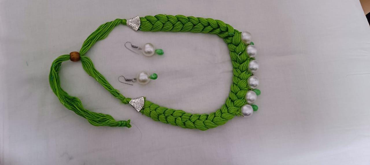 Green  braided thread necklace with pearl n pearl danglers