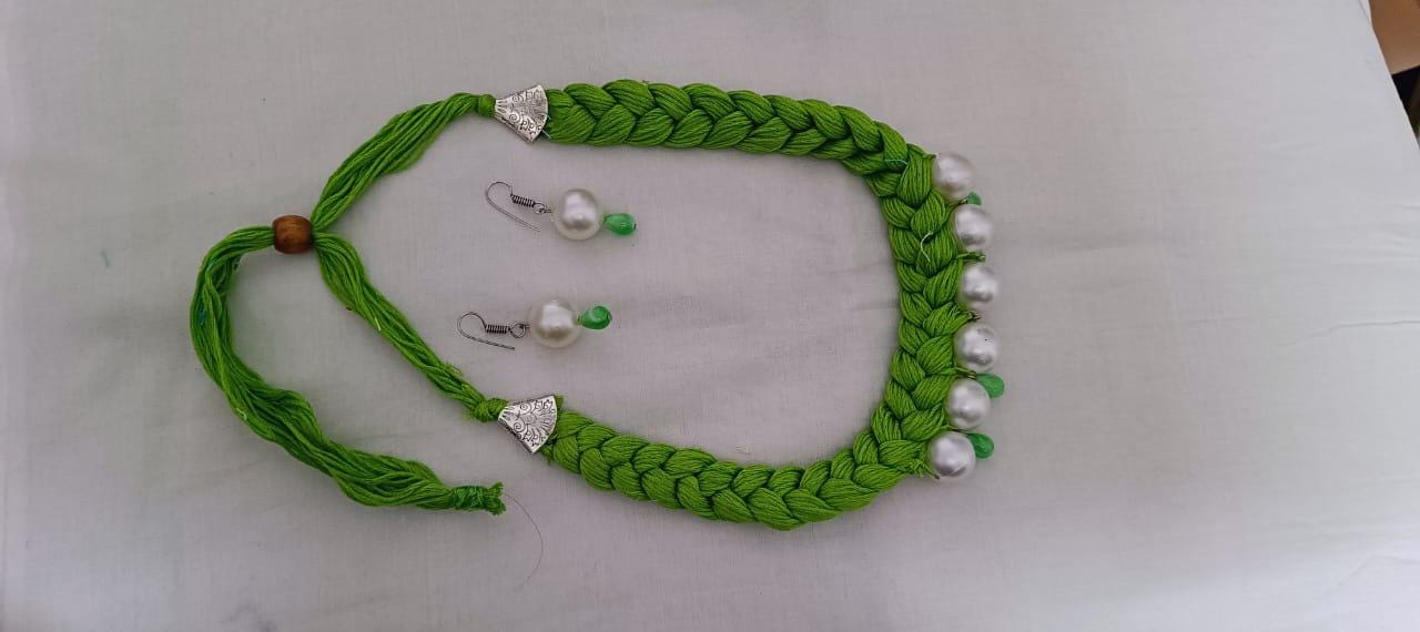 Green  braided thread necklace with pearl n pearl danglers