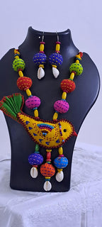 Exclusive fabric necklace with embroidered yellow fabric bird pendant and fabric beads n matching beads
