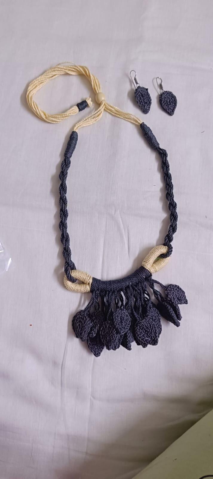 Grey Crochet thread necklace set with leaf fringes and matching earrings