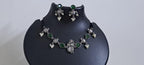 Exclusive silver oxidised lstone necklace with radha krishna pendant with matching earrings