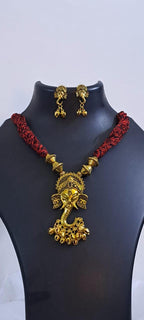 Red thread necklace with Golden oxidised traditional pendant