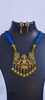 Royal blue thread necklace with Golden oxidised traditional pendant