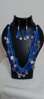 Exclusive multi-coloured and multi-layered thread necklace with silver oxidised charms
