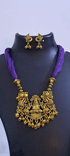Purple thread necklace with Golden oxidised traditional pendant