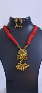 Red thread necklace with Golden oxidised traditional pendant