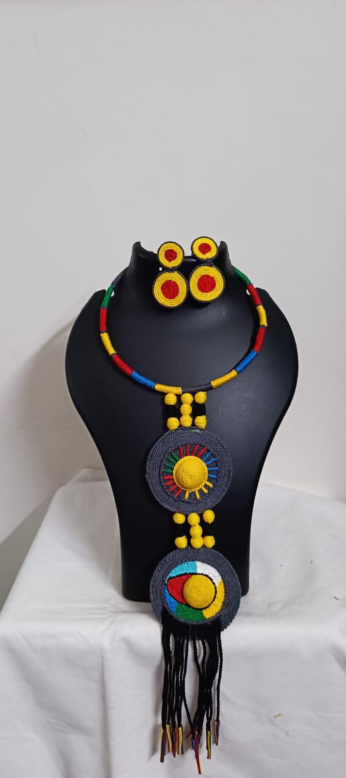 Exclusive multicoloured hasuli thread necklace set with round thread pendant n matching earrings