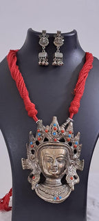 Maroon thread necklace with oxidised silver durga pendant
