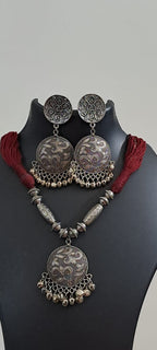 Maroon thread necklace with silver oxidised traditional pendant