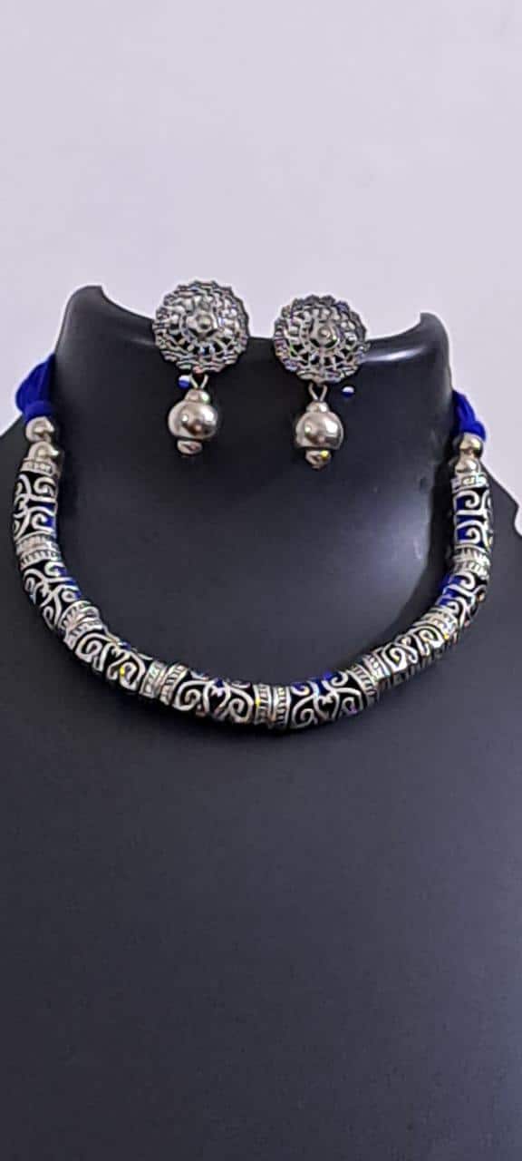 Exclusive silver oxidised hasuli set with matching earrings