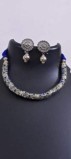 Exclusive silver oxidised hasuli set with matching earrings
