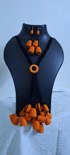 Orange thread necklace with multiple thread aparajita flower fringes n matching earrings