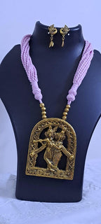 Radha Krishna golden oxidised pendant necklace in pink tread with matching earrings