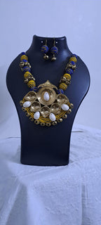 Blue yellow thread beads necklace set with dokra pendant n matching earrings