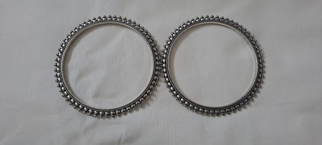 Traditional silver oxidised bangles